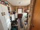 Laundry room with washer, dryer, and ample storage space at 18401 Hamilton Rd, Dade City, FL 33523