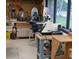 Well-equipped workshop with an array of tools and natural light at 2297 Lark E Cir # E, Palm Harbor, FL 34684