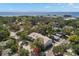 Aerial view of complex near the water offering a beautiful scenic backdrop surrounded by lush trees at 280 Dr Ml King Jr N St, Safety Harbor, FL 34695