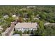 Aerial view of the townhouse in a lush neighborhood and convenient access to amenities and local attractions at 280 Dr Ml King Jr N St, Safety Harbor, FL 34695