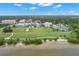 Beautiful aerial view showcasing a lush park with sandy beach, sports courts and various walkways near the water's edge at 280 Dr Ml King Jr N St, Safety Harbor, FL 34695