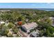 Aerial view of the Townhouse complex and lush neighborhood showing proximity to pond and natural beauty at 280 Dr Ml King Jr N St, Safety Harbor, FL 34695