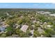 Aerial view of the area surrounding the home featuring lush trees that create a serene living environment at 280 Dr Ml King Jr N St, Safety Harbor, FL 34695