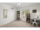 Bright room with a window desk, bookshelf, and ample natural lighting at 280 Dr Ml King Jr N St, Safety Harbor, FL 34695