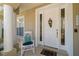 Inviting front porch with white columns, rocking chair, and a charming welcome mat at 280 Dr Ml King Jr N St, Safety Harbor, FL 34695