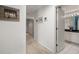 Hallway with carpet leading to a bedroom and bathroom at 280 Dr Ml King Jr N St, Safety Harbor, FL 34695