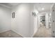 Hallway with carpet leading to a bedroom and bathroom at 280 Dr Ml King Jr N St, Safety Harbor, FL 34695