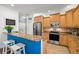 Open kitchen featuring granite countertops, stainless steel appliances and wooden cabinetry at 280 Dr Ml King Jr N St, Safety Harbor, FL 34695