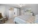 Bedroom with large window, rocker and view to ensuite bathroom at 280 Dr Ml King Jr N St, Safety Harbor, FL 34695