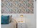 A close-up of bedroom showcasing vibrant wallpaper and a sleek nightstand at 2912 W Winthrop Rd, Tampa, FL 33611
