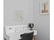 A close-up of an office desk, complete with decor and desk organizer at 2912 W Winthrop Rd, Tampa, FL 33611
