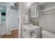 Charming bathroom with a modern vanity, soft lighting, and wood-look flooring, offering a clean and fresh aesthetic at 2915 67Th Way N, St Petersburg, FL 33710