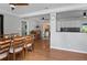 Bright dining room features hardwood floors and a view of the well-equipped kitchen at 2915 67Th Way N, St Petersburg, FL 33710