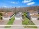 Charming single-Gathering home featuring a brick paved driveway, attached two-car garage, and beautifully manicured lawn at 31046 Lindentree Dr, Wesley Chapel, FL 33543