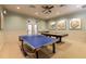 Recreation room with a ping pong and billiards table for hours of entertainment at 31046 Lindentree Dr, Wesley Chapel, FL 33543