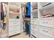 A well-organized walk-in closet with custom shelving and plenty of storage space at 31046 Lindentree Dr, Wesley Chapel, FL 33543