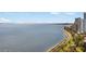 Panoramic view of the ocean, highway, and cityscape from a high-rise building at 3301 Bayshore Blvd # 2007B, Tampa, FL 33629