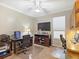 Home office with two workstations, a ceiling fan, a window, and ample workspace at 3876 Timber Ridge Ct, Palm Harbor, FL 34685