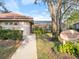 Pool area entrance showcasing the Salem Village Cabana and Pool, reserved for residents only at 3876 Timber Ridge Ct, Palm Harbor, FL 34685