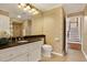 Bathroom featuring wallpaper, tile floors, and a granite vanity at 407 S West Shore Blvd, Tampa, FL 33609