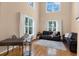 Inviting living space featuring soaring ceilings, large windows, and comfortable seating for a relaxing atmosphere at 407 S West Shore Blvd, Tampa, FL 33609