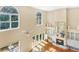 Bright living room featuring a fireplace, built ins, and large windows at 407 S West Shore Blvd, Tampa, FL 33609