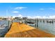 Private boat dock providing direct access to the water, offering convenience for boating and water activities at 436 St Andrews Dr, Belleair, FL 33756