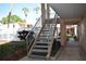 Exterior shot of the community showcasing lush landscaping and stairs to the units at 4702 Michael Ct # 139, Tampa, FL 33614