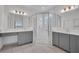 Modern bathroom with a glass shower and double vanity sinks at 4760 Avila Lakes Dr, Wimauma, FL 33598