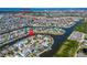 Waterfront property on canal with Tampa Bay access, marked with red pin and dashed lines at 5616 Seagrass Pl, Apollo Beach, FL 33572