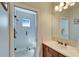 Modern bathroom featuring a glass-enclosed shower and a bright, clean aesthetic at 5616 Seagrass Pl, Apollo Beach, FL 33572
