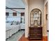 Bedroom with a stylish mirror and wooden dresser with drawers at 5616 Seagrass Pl, Apollo Beach, FL 33572