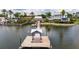 Picturesque wooden dock with a gazebo, offering a serene spot to relax by the water at 5616 Seagrass Pl, Apollo Beach, FL 33572