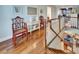 Hallway with a staircase, leading to the living room at 5616 Seagrass Pl, Apollo Beach, FL 33572