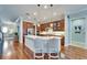 Kitchen features a large island with seating, stainless steel appliances, and modern finishes at 5616 Seagrass Pl, Apollo Beach, FL 33572