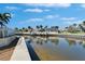 Stunning waterfront panorama featuring luxurious homes, docks, boats and serene canal views at 5616 Seagrass Pl, Apollo Beach, FL 33572