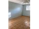A bedroom featuring tile floors, a window with blinds, and a ceiling fan at 5750 80Th N St # A106, St Petersburg, FL 33709