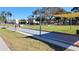 Community bocce court with benches, seating, and shade canopies for outdoor recreational activities at 5750 80Th N St # A106, St Petersburg, FL 33709