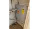 View of utility closet with a modern AC system installed at 5750 80Th N St # A106, St Petersburg, FL 33709