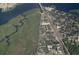 Aerial view of property close to a lush green mangrove and open water at 6103 Anna Ave, Gibsonton, FL 33534