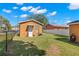 Rear view of house with fenced yard at 6103 Anna Ave, Gibsonton, FL 33534