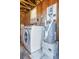 Functional laundry area features a modern washer, water heater, and ample space for convenience at 6103 Anna Ave, Gibsonton, FL 33534