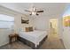 Bright bedroom with queen bed and en suite bathroom at 6339 S Lansdale Cir, Tampa, FL 33616