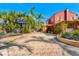 Charming home featuring a large driveway with lush landscaping, perfect for outdoor enjoyment at 681 Jasmine S Way, St Petersburg, FL 33705