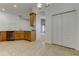 Kitchen with stainless steel dishwasher and sink, granite countertop and light wood cabinets at 869 Vino Verde Cir, Brandon, FL 33511