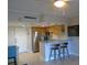 Modern kitchen with stainless steel appliances and sleek countertops at 880 Mandalay Ave # C412, Clearwater Beach, FL 33767