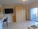 Living area with a wall bed, balcony, and an airy feel at 880 Mandalay Ave # C412, Clearwater Beach, FL 33767