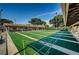 A community shuffleboard court with overhead protection at 2297 Lark E Cir # E, Palm Harbor, FL 34684