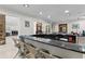 Well-appointed bar area with granite countertop and comfortable seating, perfect for entertaining guests at 10265 Gandy N Blvd # 1203, St Petersburg, FL 33702