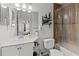 Bathroom with white sink vanity and shower with curtain rod at 10265 Gandy N Blvd # 1203, St Petersburg, FL 33702